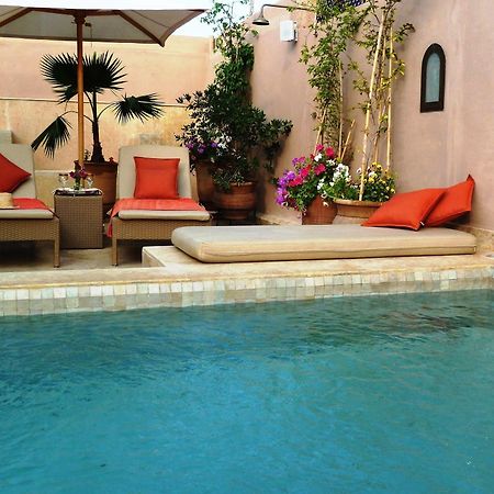 Riad Viva Marrákes Kültér fotó A swimming pool in Morocco